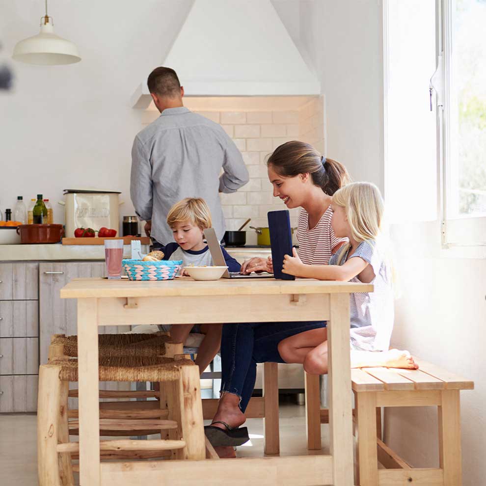 a family eating in their kitchen